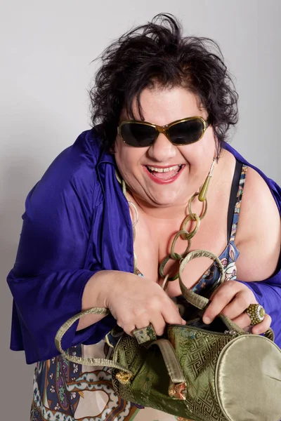 Portrait of cheerful woman with her bag — Stock Photo, Image