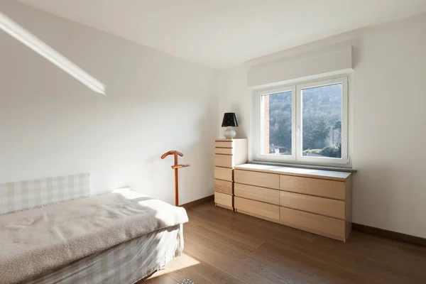 Interior, wooden cupboard under the window — Stock Photo, Image