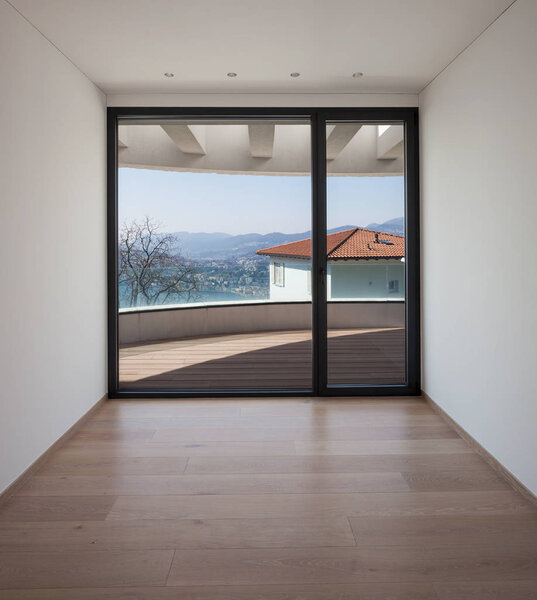 Empty room with wide window