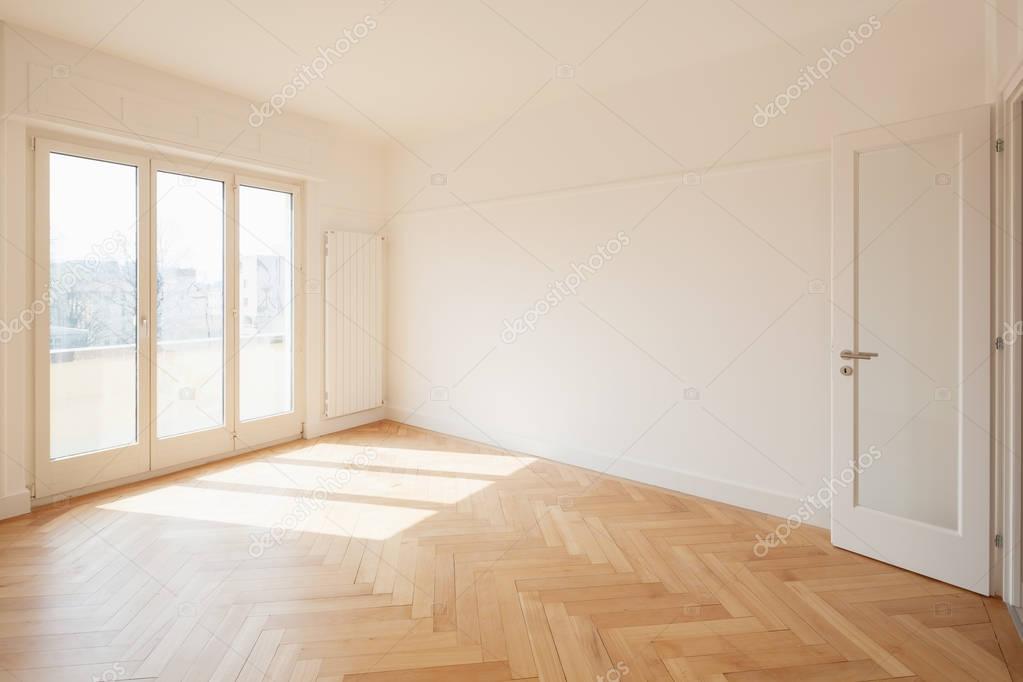 Empty room, just a angle and part of window
