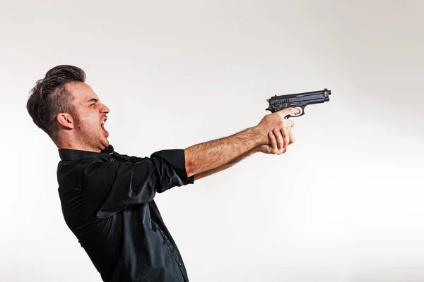 Boy with gun in his hand — Stock Photo, Image