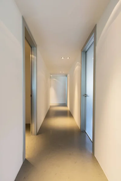 Trick of light in white corridor — Stock Photo, Image