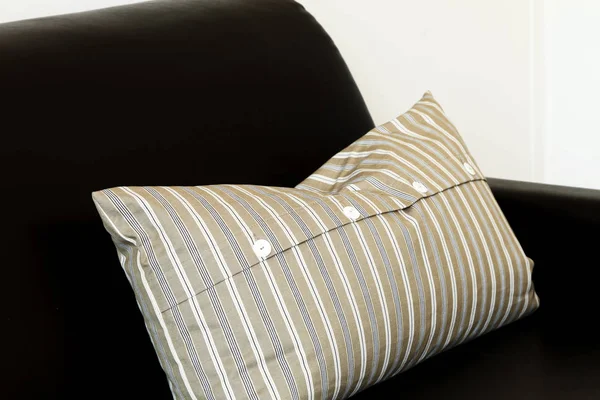 Striped pillow on the sofa — Stock Photo, Image