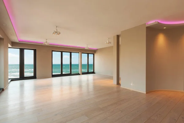 Living room in a modern apartment, sea view — Stock Photo, Image