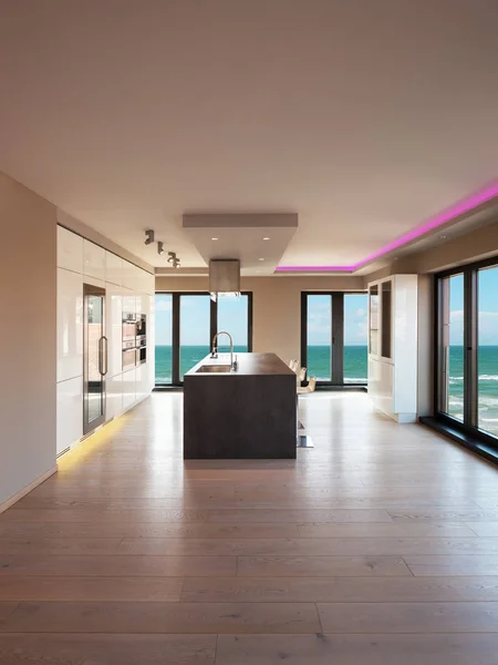 Interiors of a modern apartment, kitchen with sea view — Stock Photo, Image