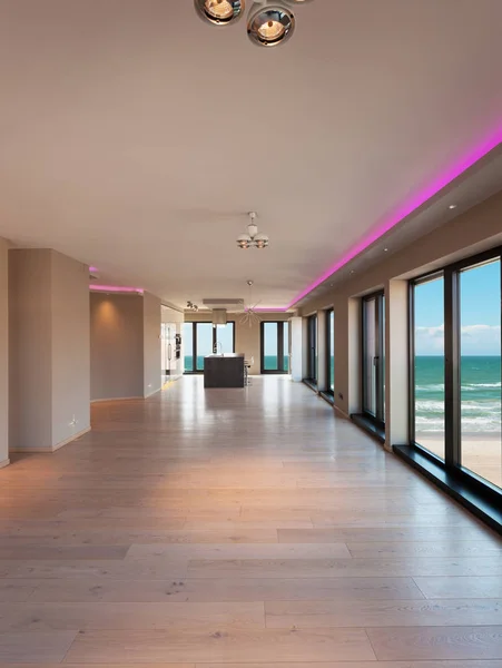 Interiors of a modern apartment, dining room with sea view — Stock Photo, Image