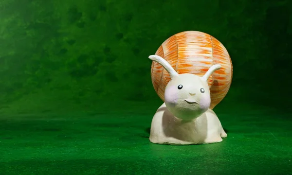 Cute Puppet Handmade Small Snail Green Background — Stock Photo, Image