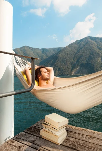 Portrait of a young man near the lake — Stock Photo, Image