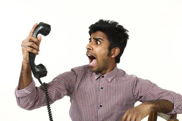 Jovem homem retrato com vintage telefone — Fotografia de Stock