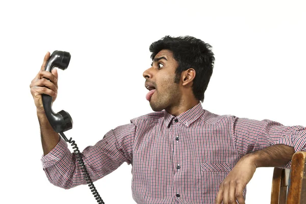 Portret van de jonge man met vintage telefoon — Stockfoto