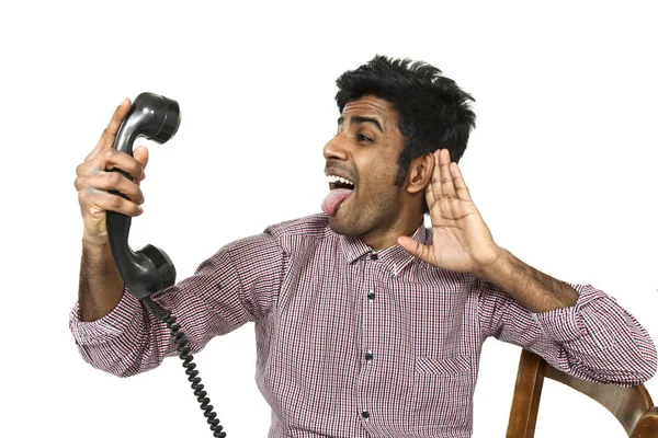 Portrét mladého muže s historickým telefonem — Stock fotografie