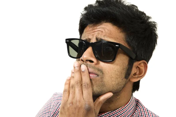 Young man portrait working with the laptop sitting on a chair — Stock Photo, Image