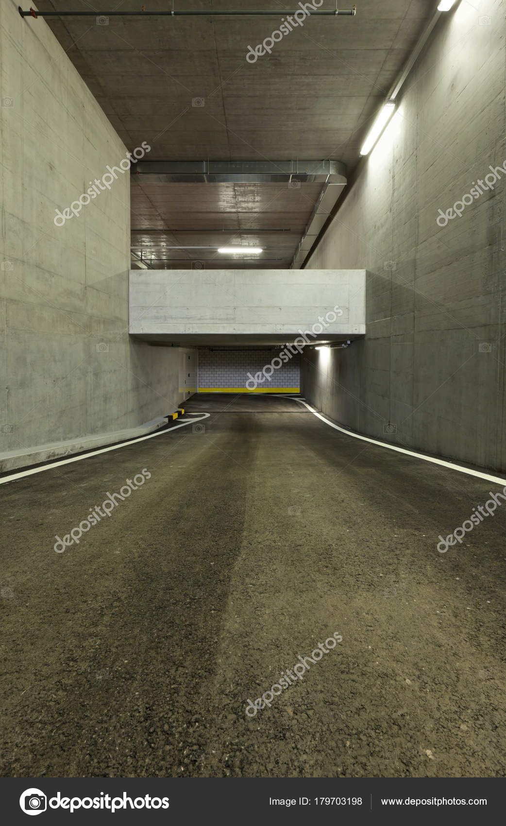 New Underground Parking Tunnel Stock Photo by ©Zveiger 179703198