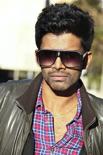 Young indian man portrait wearing sunglasses ( outdoor ) — Stock Photo, Image