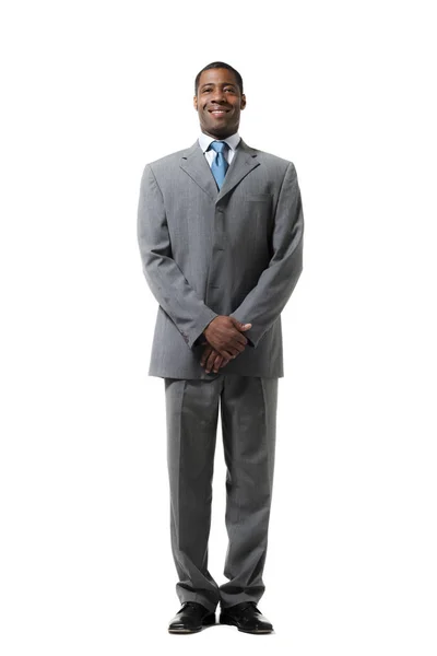 Black businessman portrait wearing suit over white background — Stock Photo, Image