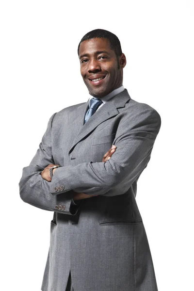 Black businessman portrait wearing suit over white background — Stock Photo, Image