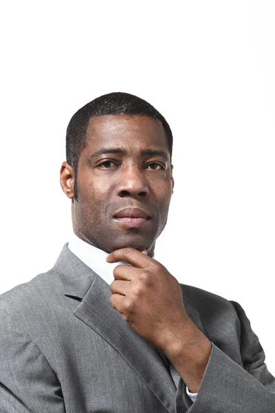 Black businessman portrait wearing suit over white background — Stock Photo, Image