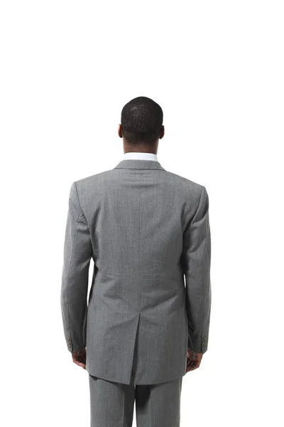 Nero uomo d'affari ritratto indossando vestito su sfondo bianco — Foto Stock