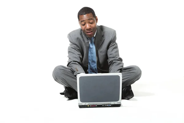 Black businessman portrait wearing suit over white background — Stock Photo, Image