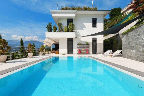 white house with swimming pool