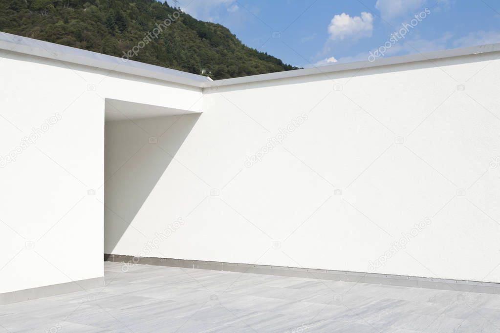 new white wall on the terrace