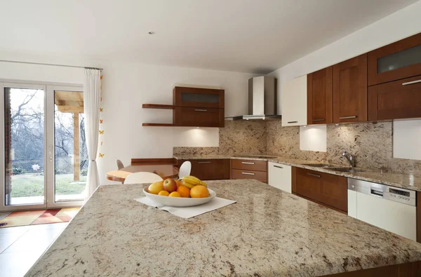 Marble and wood, furnished kitchen interior — Stock Photo, Image