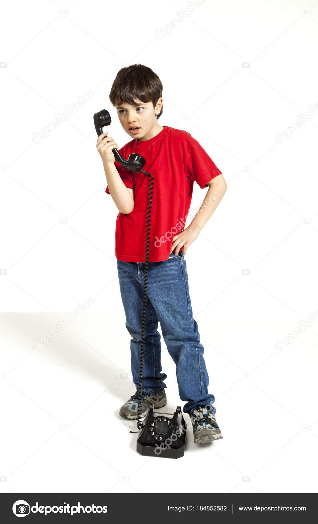 Little boy with red shirt on white background Stock Photo by ©Zveiger