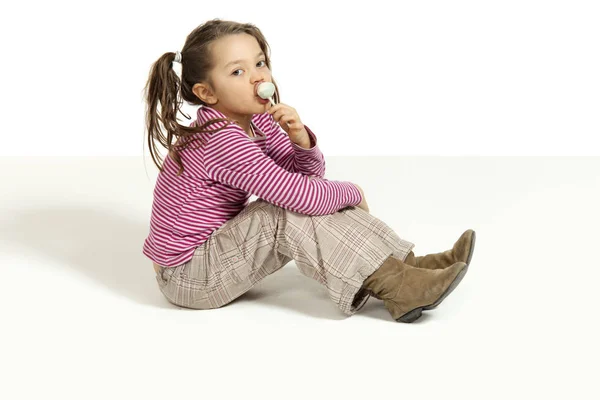 Little girl on a white background — Stock Photo, Image