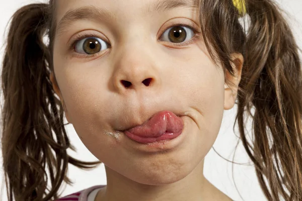 Niña sobre un fondo blanco — Foto de Stock