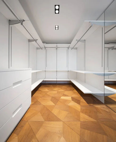 Large white walk-in closet with parquet — Stock Photo, Image