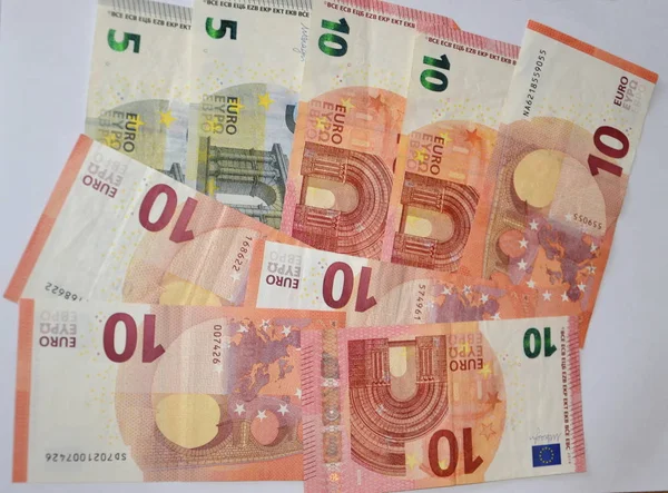 Ten Euro, five Euro banknotes in a  pile — Stock Photo, Image