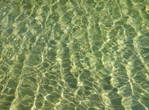 Κυματιστές πράσινες νερό φόντο — Φωτογραφία Αρχείου