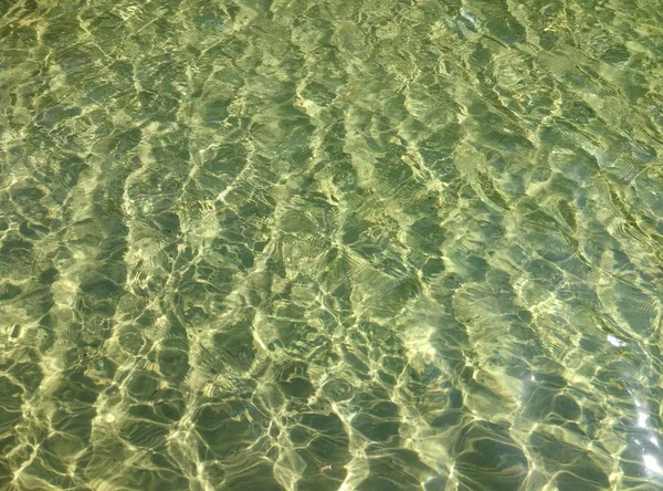 Wavy green water background — Stock Photo, Image