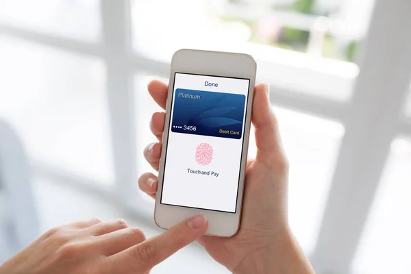 Women hands holding white phone debit card app touch pay — Stock Photo, Image