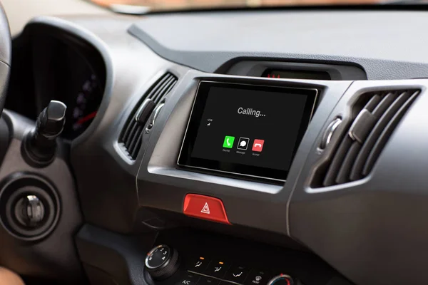 Multimedia system with phone calling on screen in the car — Stock Photo, Image