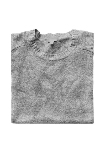 Διπλωμένο πουλόβερ απομονωθεί — Φωτογραφία Αρχείου