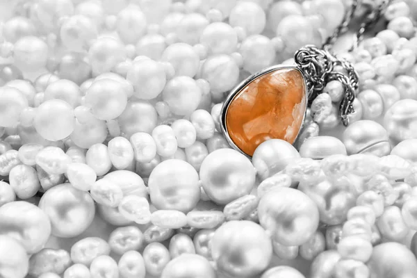 Amber pendant and pearl — Stock Photo, Image