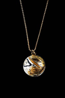 Gold ball pendant