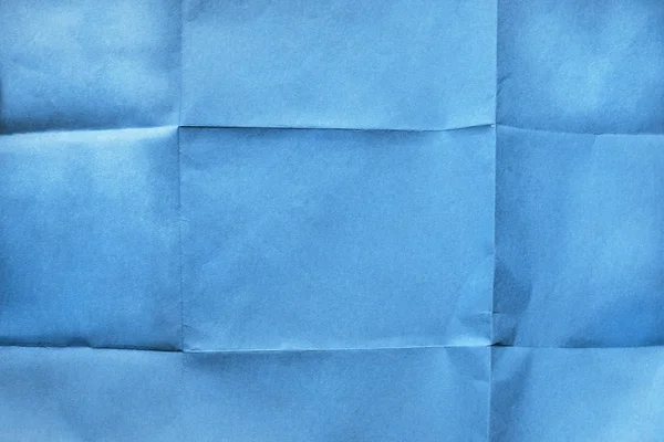 Gevouwen blauw papier — Stockfoto