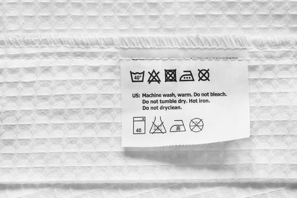 Washing instructions label — Stock Photo, Image