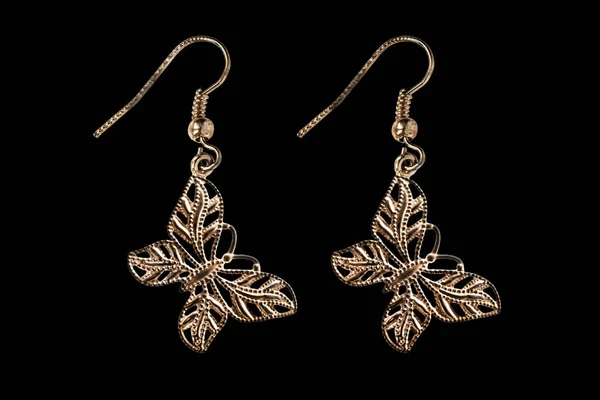 Golden butterfly earrings — Stock Photo, Image