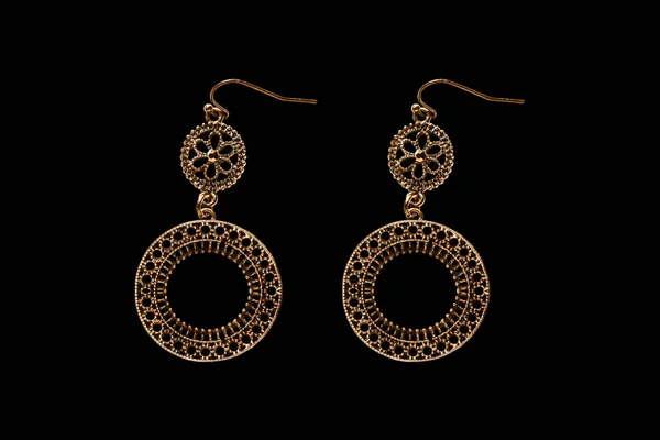 Golden earrings isolated — Stock Photo, Image