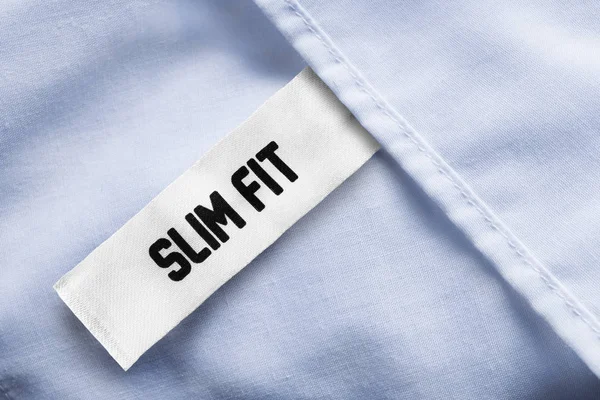 Slim fit етикетки — стокове фото