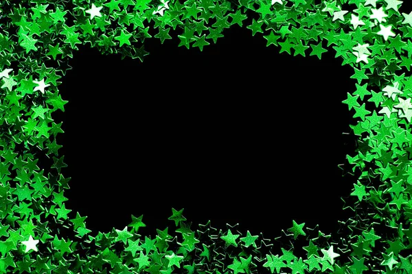 Grönt glitter på svart — Stockfoto