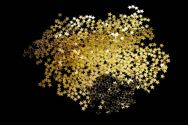 Gouden glitter op zwart — Stockfoto