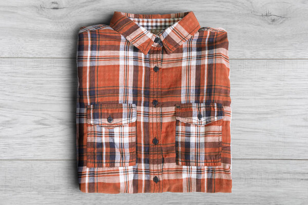 Shirt on wooden background