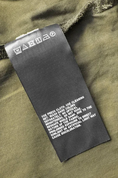 Cuidado de la etiqueta ropa — Foto de Stock