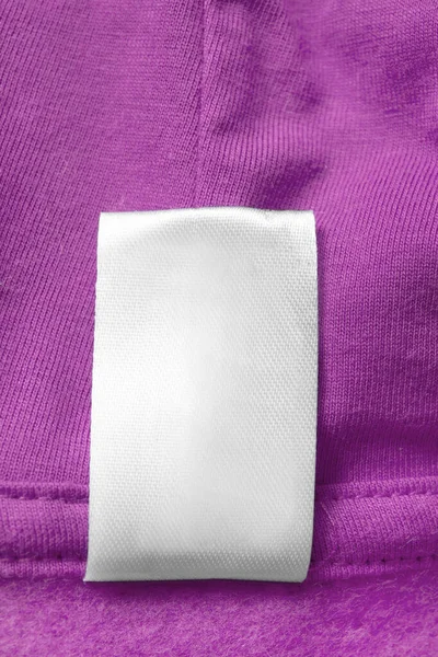 Blank White Textile Clothes Label Magenta Pink Textile Background — Stock Photo, Image