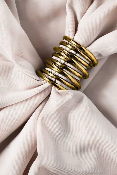 Gold Decorative Ring Beige Draped Silk Closeup — Stock Photo, Image