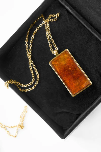 Large Amber Pendant Gold Chain Black Jewel Box Closeup — Stock Photo, Image